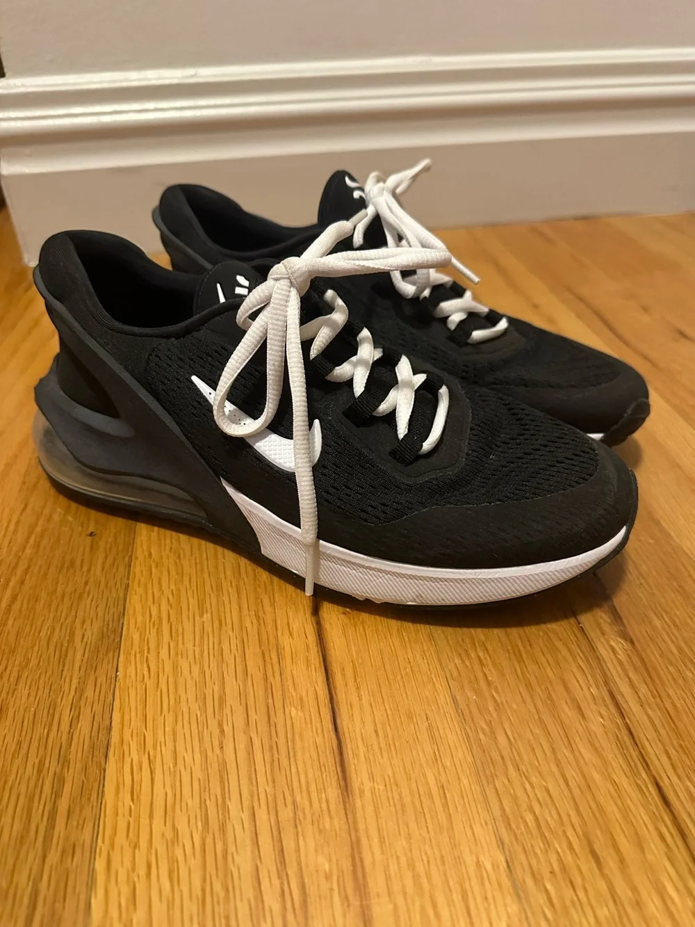 Nike women’s Black and White Sneakers